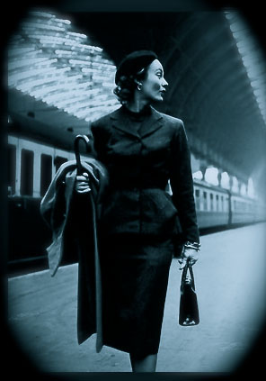 Who is the woman at the train station?